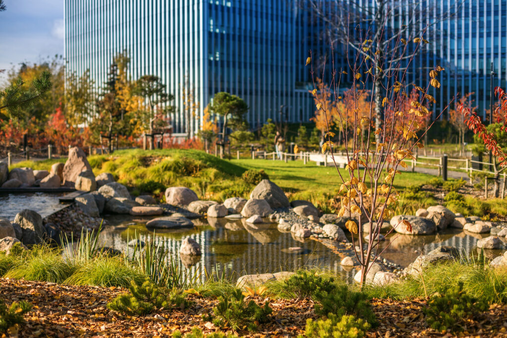 A beautiful commercial landscape outside a large skyscraper